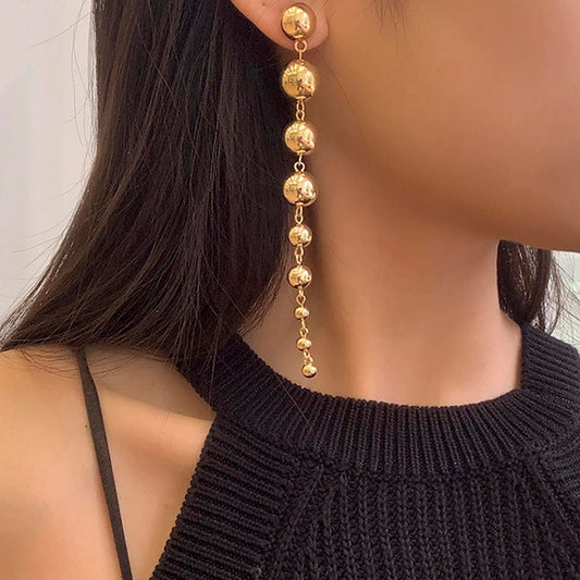 Pendientes Colgantes de Perla Dorada