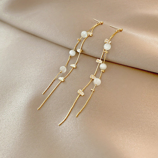 Pendientes Colgantes de Perla en Oro